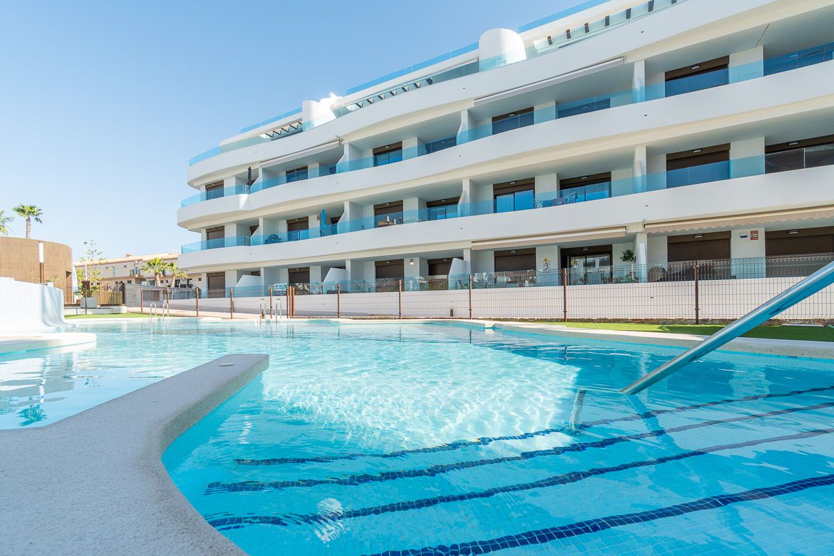 Living room with windows in 2-bedroom apartment, La Zenia