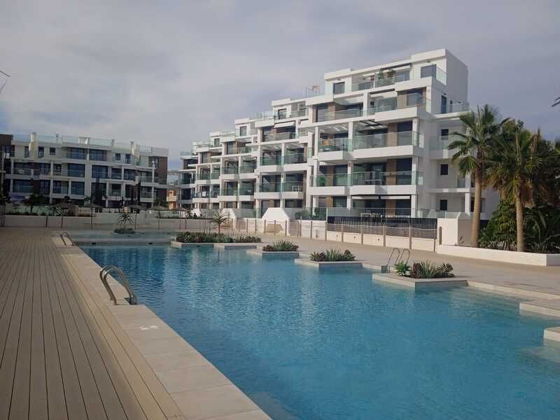 Communal pool area of new-build development, L'Almadrava-L'Estanyò, Denia