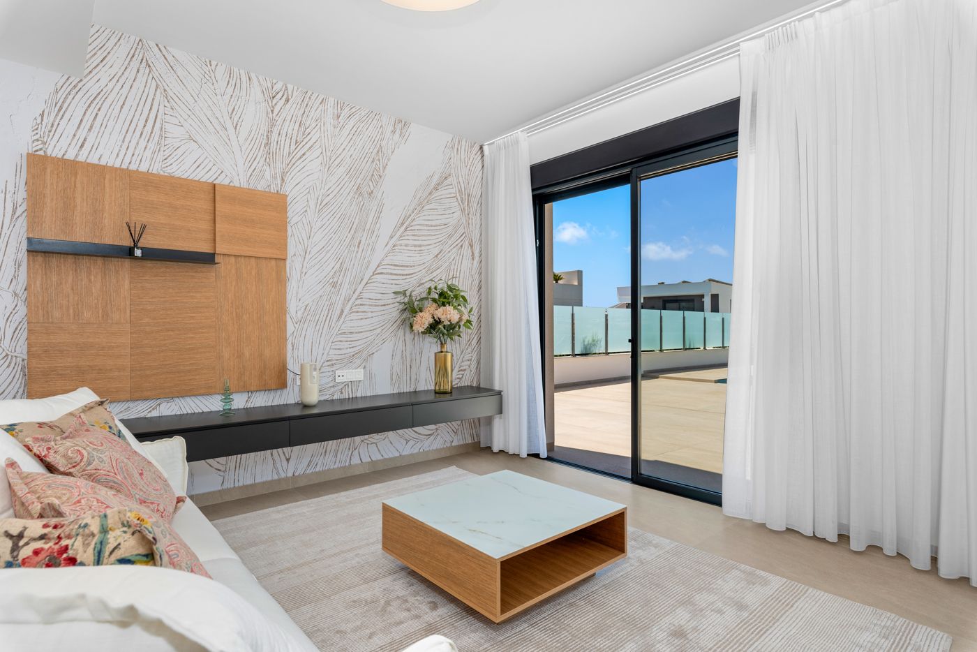 Living area with floor-to-ceiling glazing in villa, Campoamor
