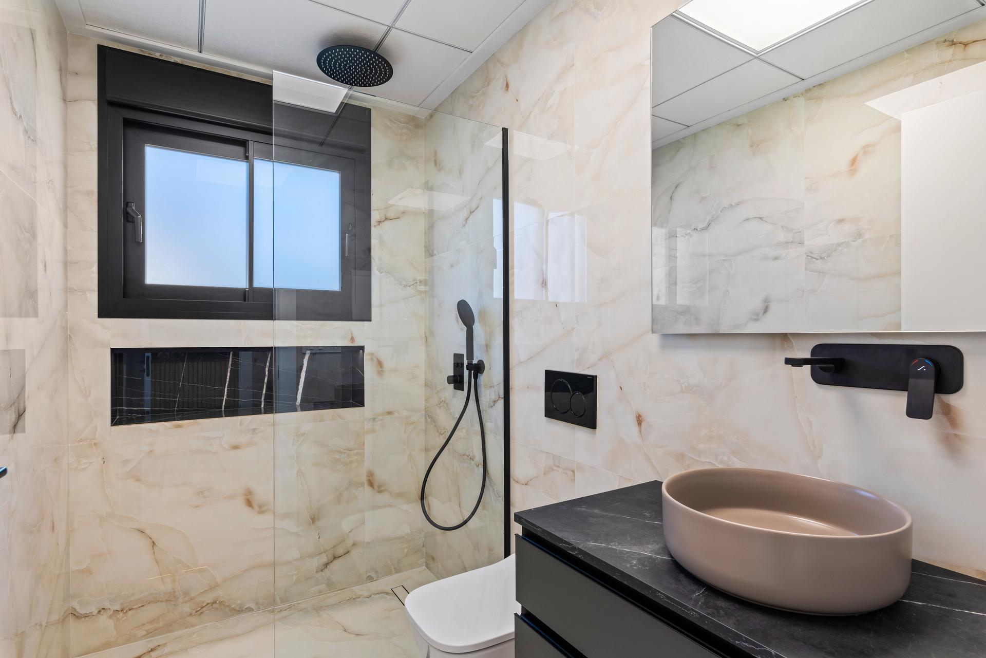 Bathroom with shower fittings in new-build villa, Algorfa