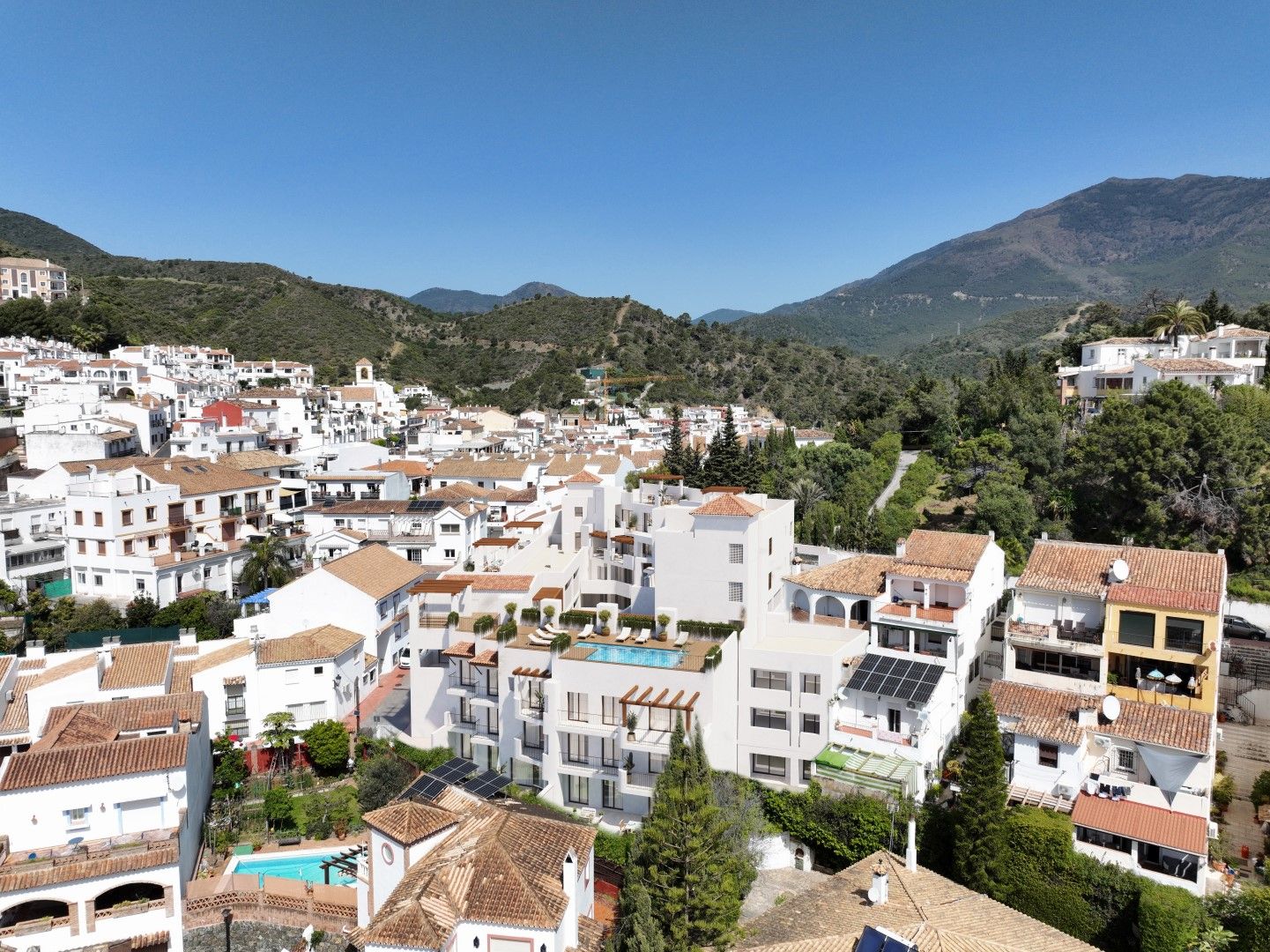 Pool surround and sun terrace in new-build development, Benahavis