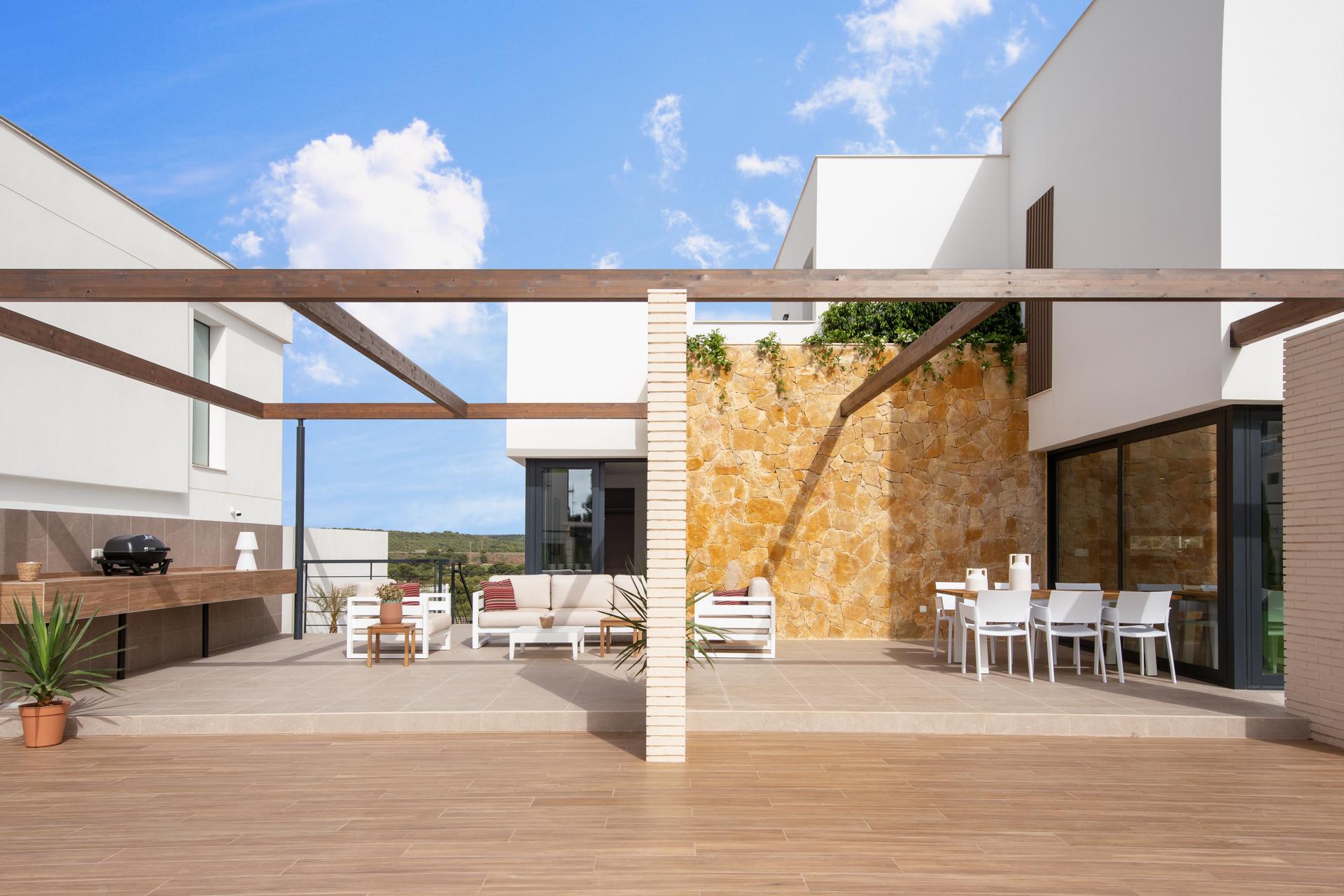 Evening render of new-build villa exterior in Campoamor, Orihuela Costa
