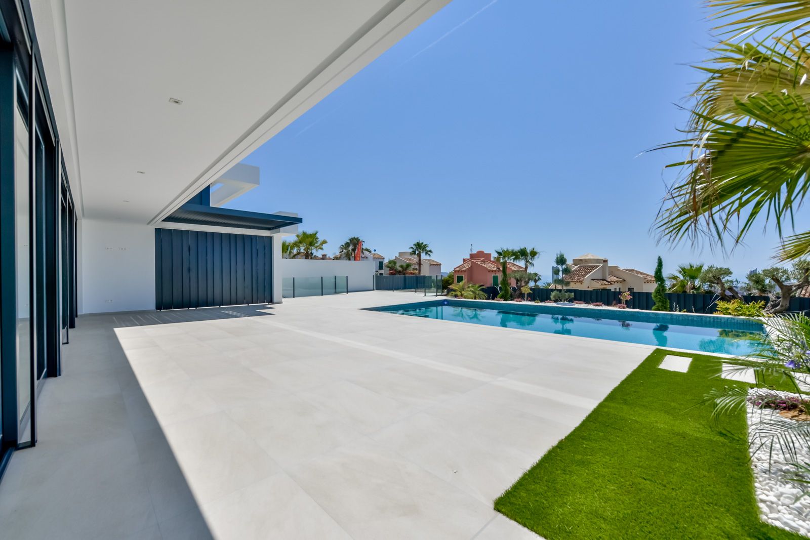 Garden level and pool surrounds in Sierra Cortina villa, Finestrat