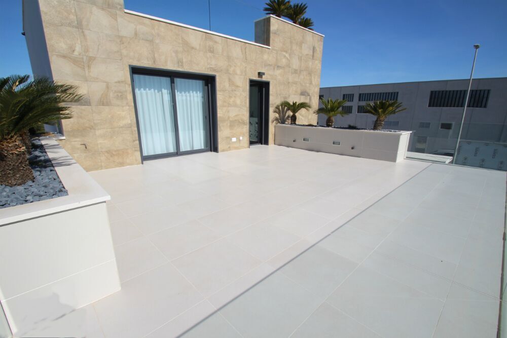 Exterior at dusk, new-build 4-bedroom villa in Bellavista, San Miguel De Salinas