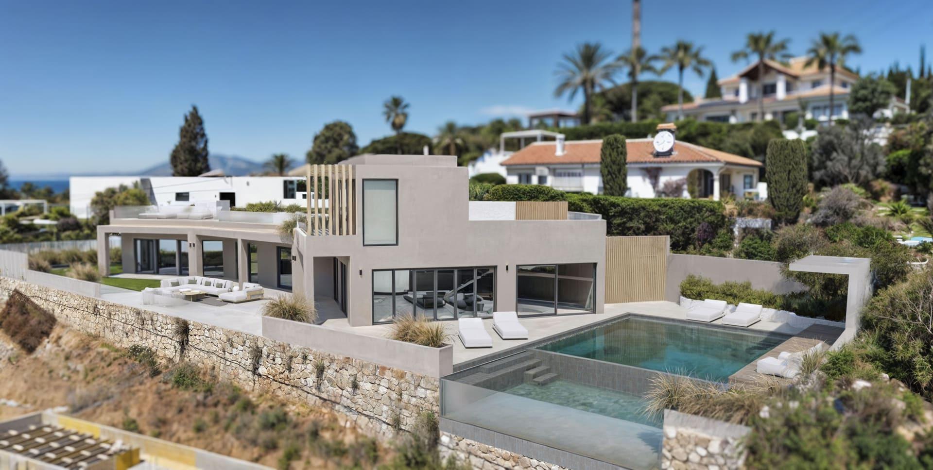 Pool deck with sun lounger space in Santa María villa, Marbella