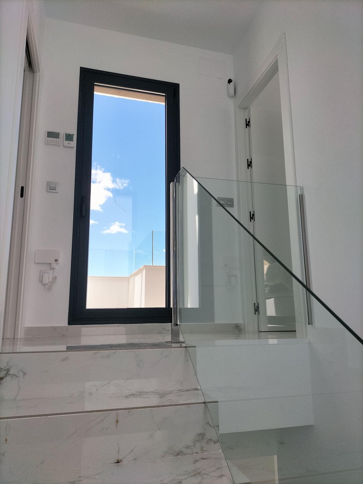 Communal pool from terrace level, development in Pinar de Campoverde