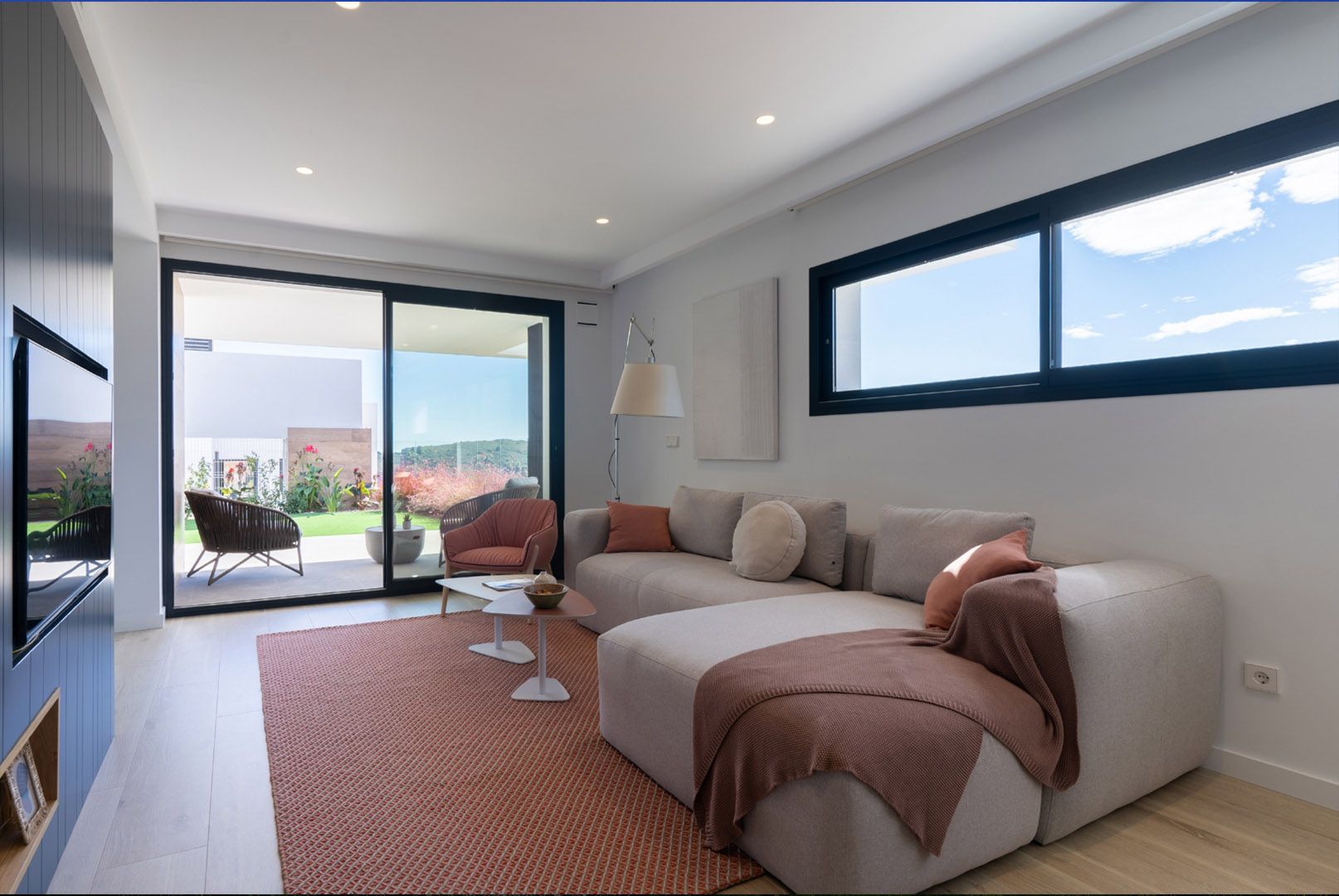 Communal area with sun loungers by the pool
