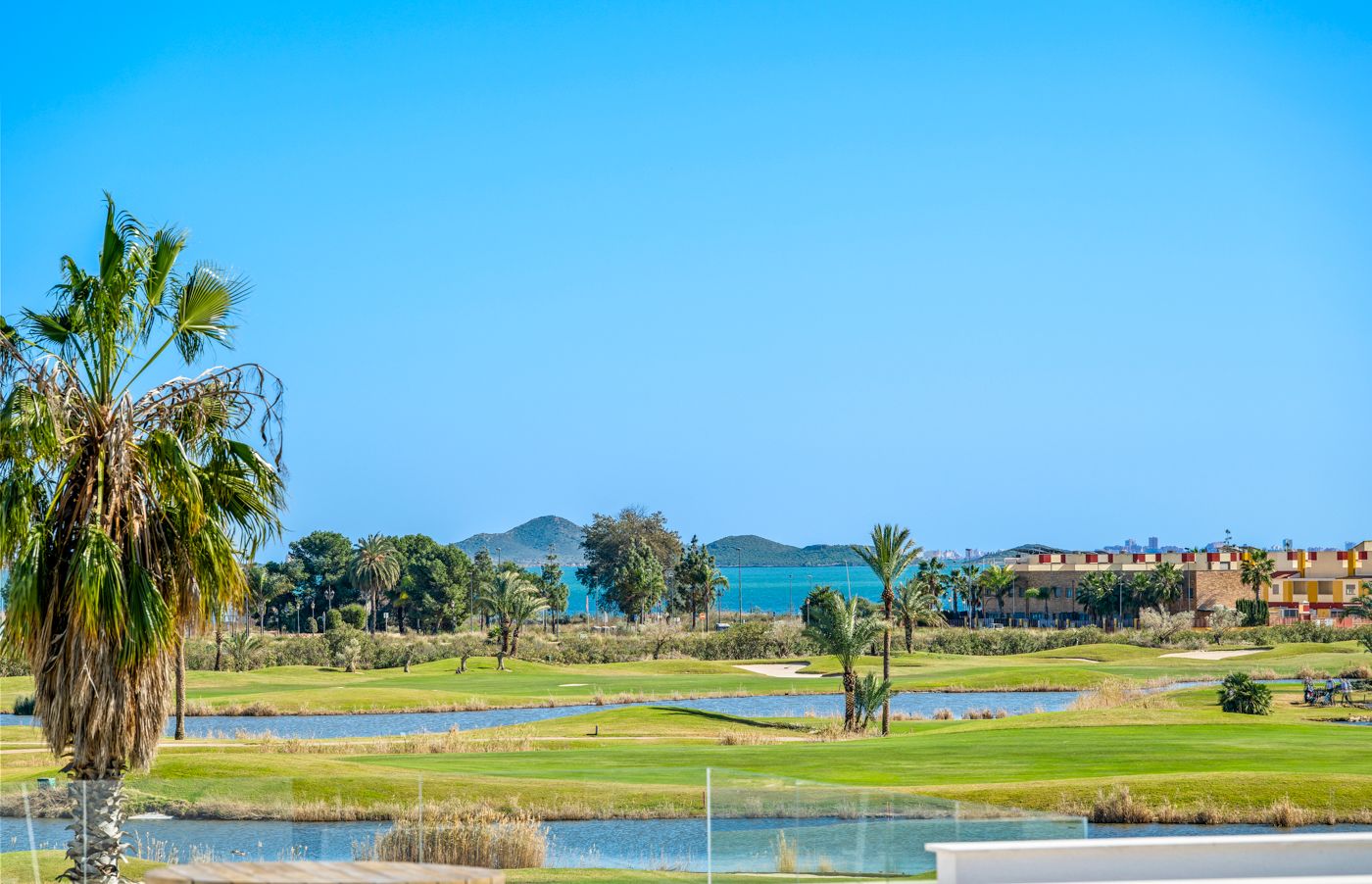 Exterior view of residential block with landscaping, Las Lomas del Rame