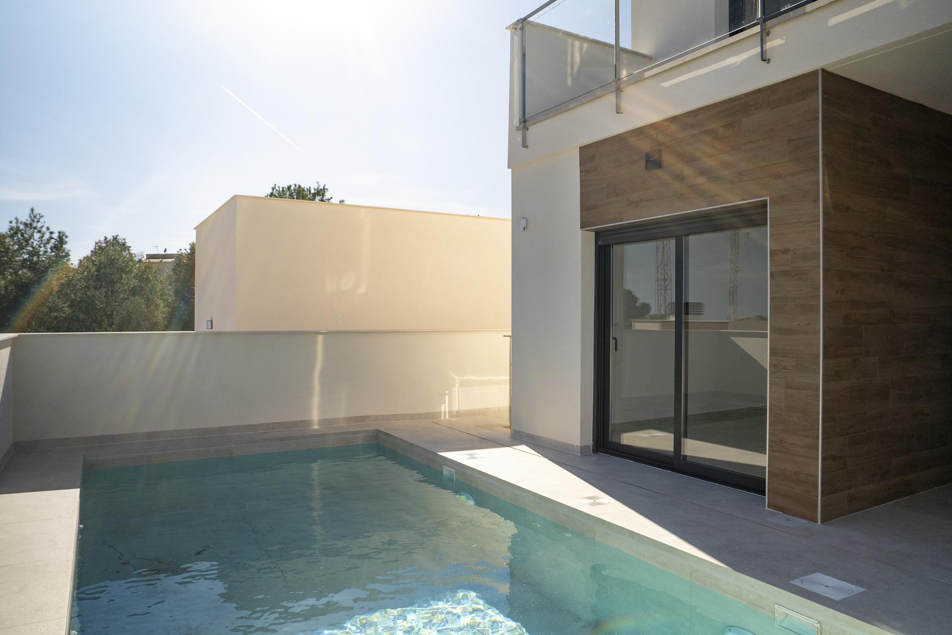 Parking spaces from villa entrance, Coloma new build