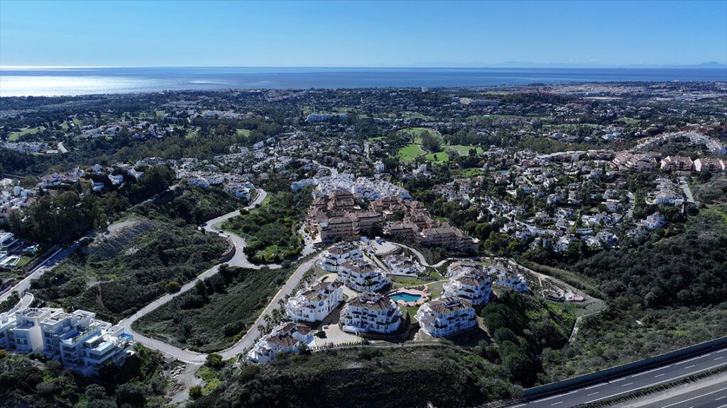 Night-time exterior of new-build development in La Cerquilla, Marbella