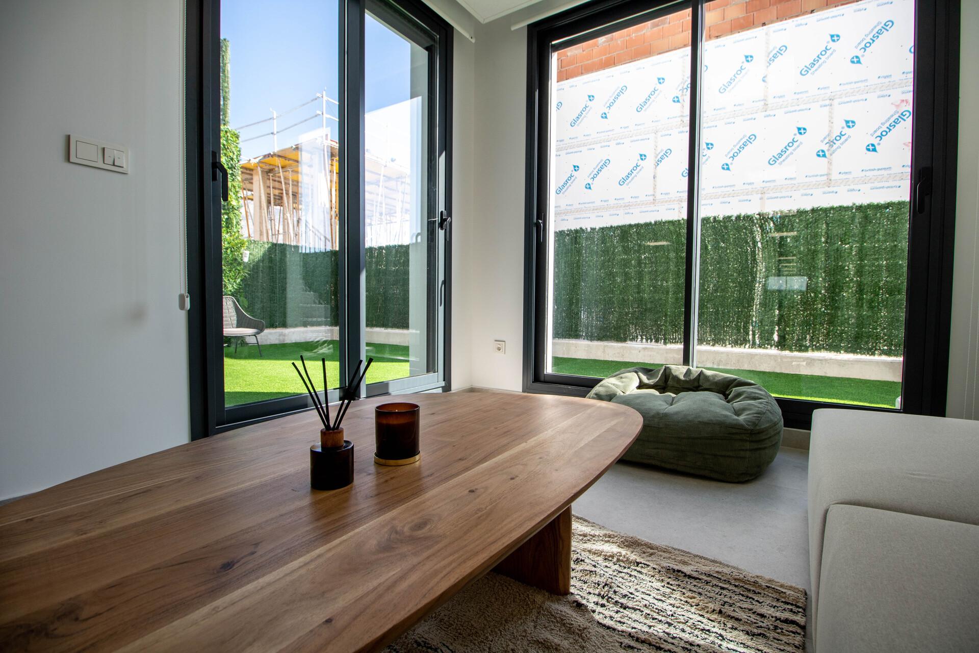 Lounge area with windows, new-build villa, Golf Puig Campana