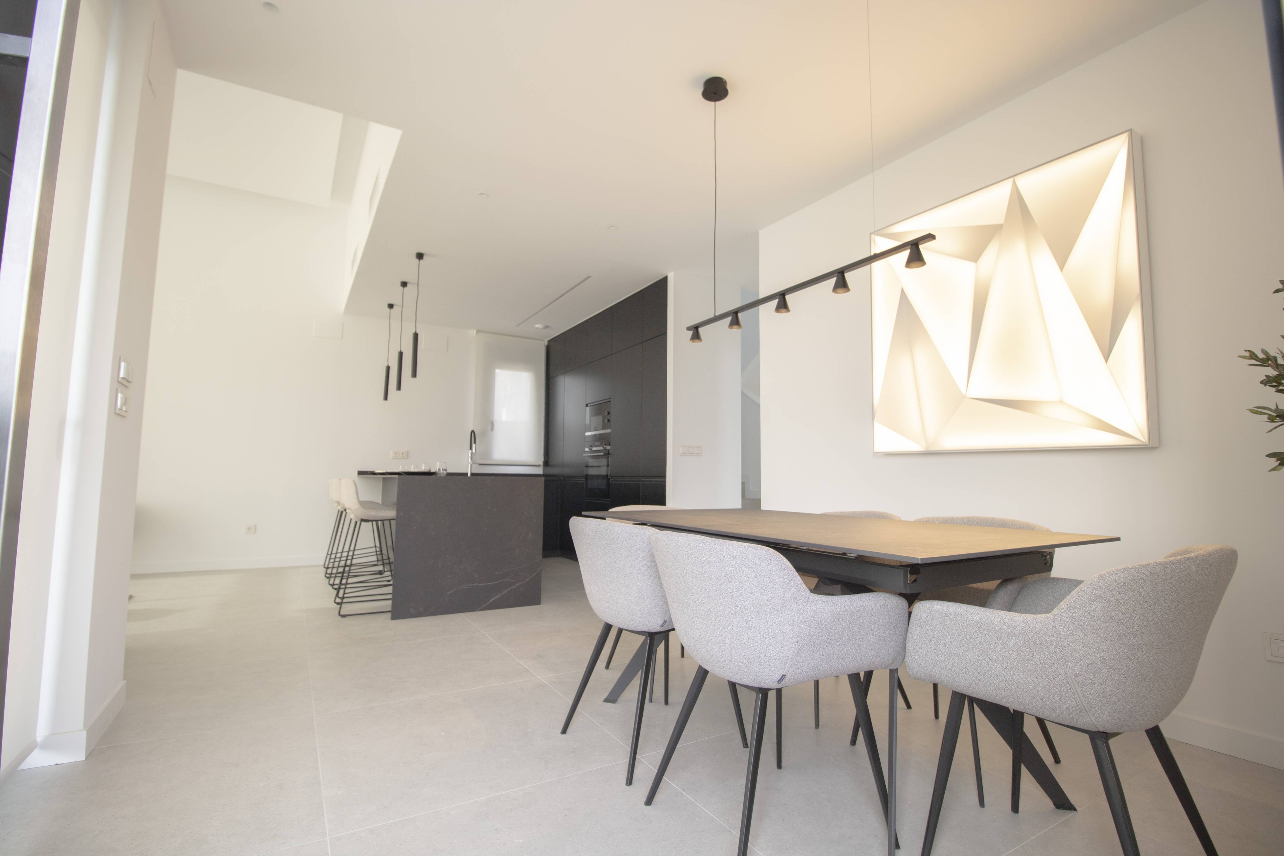 Open-plan kitchen and dining area in 3-bedroom villa, Golf Puig Campana
