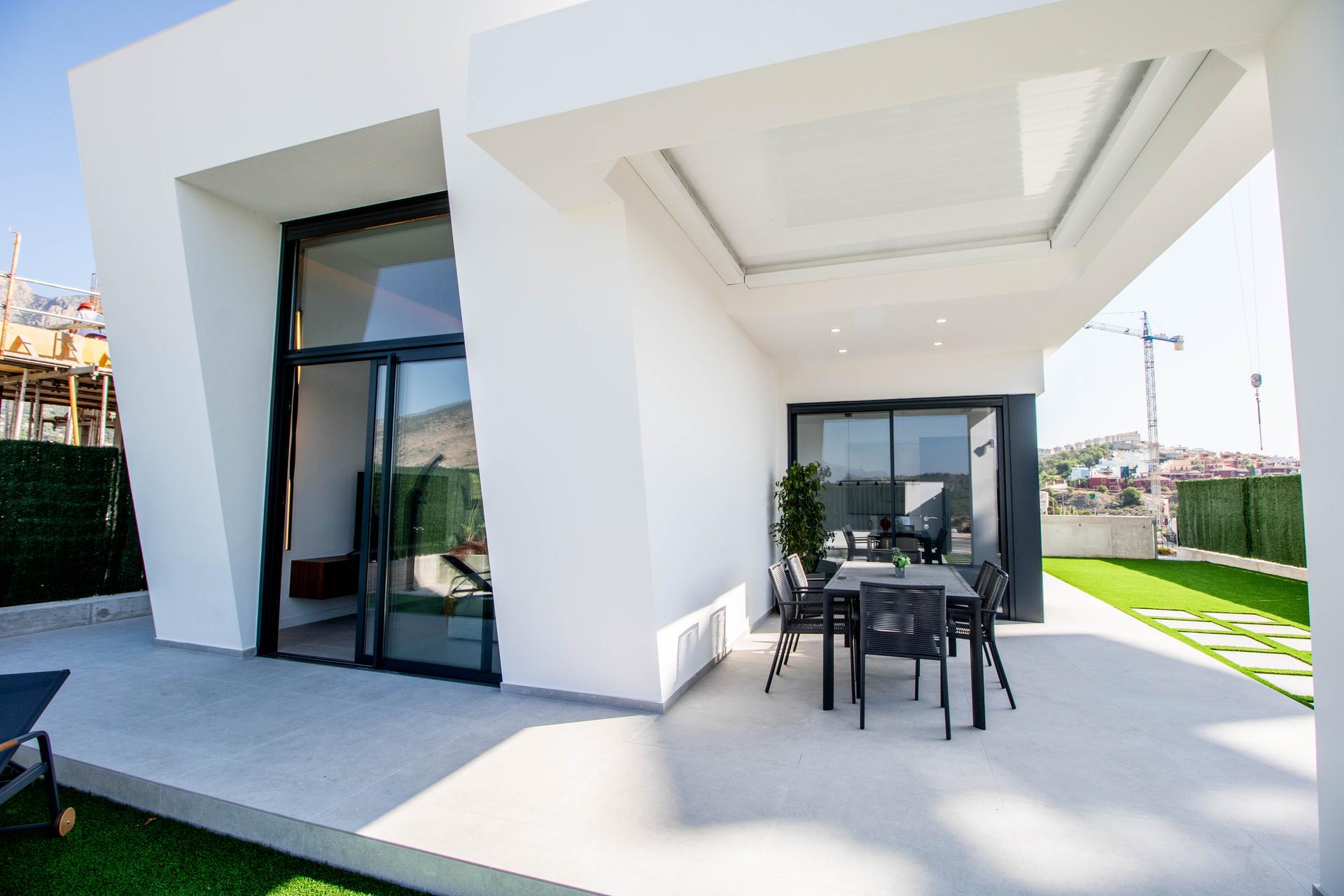 Bedroom window overlooking garden, 3-bed villa, Golf Puig Campana
