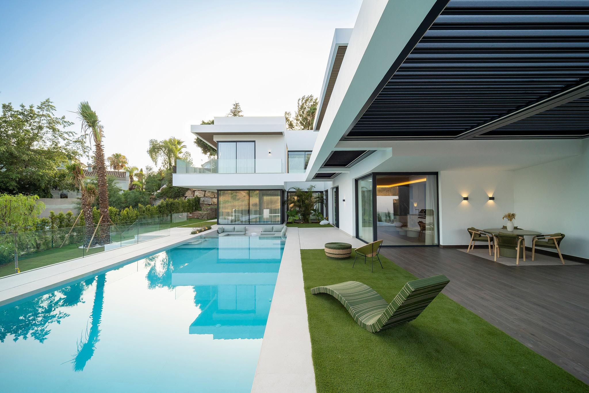 Outdoor seating area at ground level, villa in El Paraíso