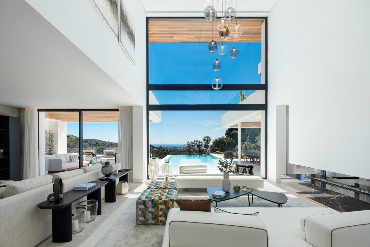 Living room with large windows in new-build villa, La Quinta