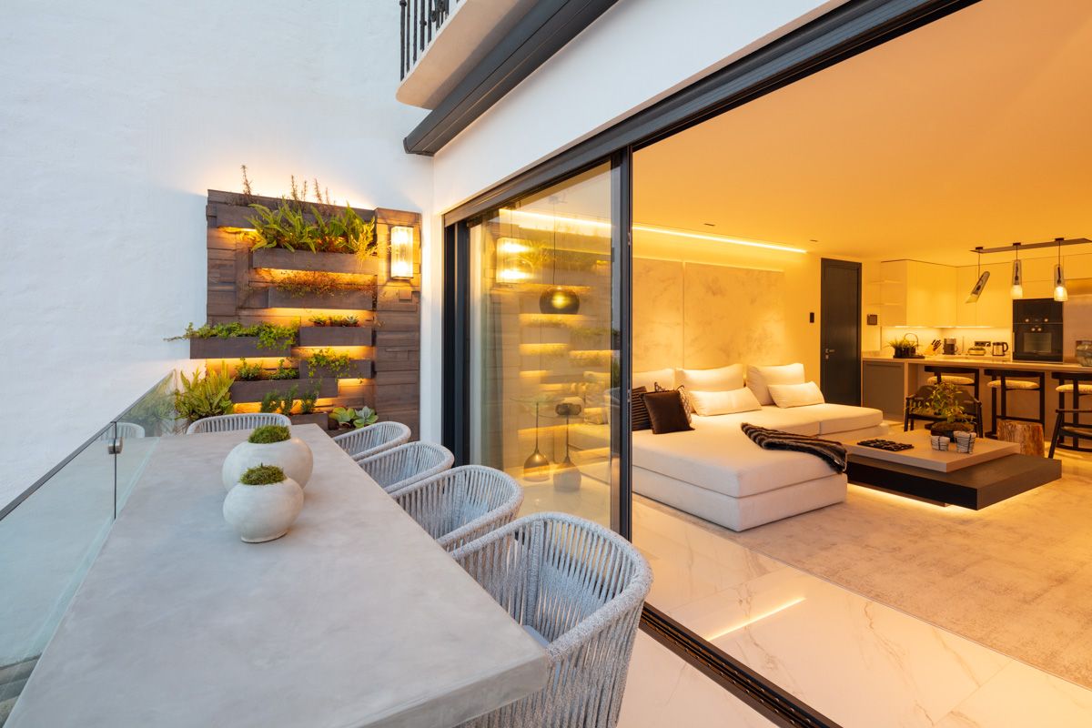 Living room with floor-to-ceiling glazing in new-build apartment, Puerto, Marbella