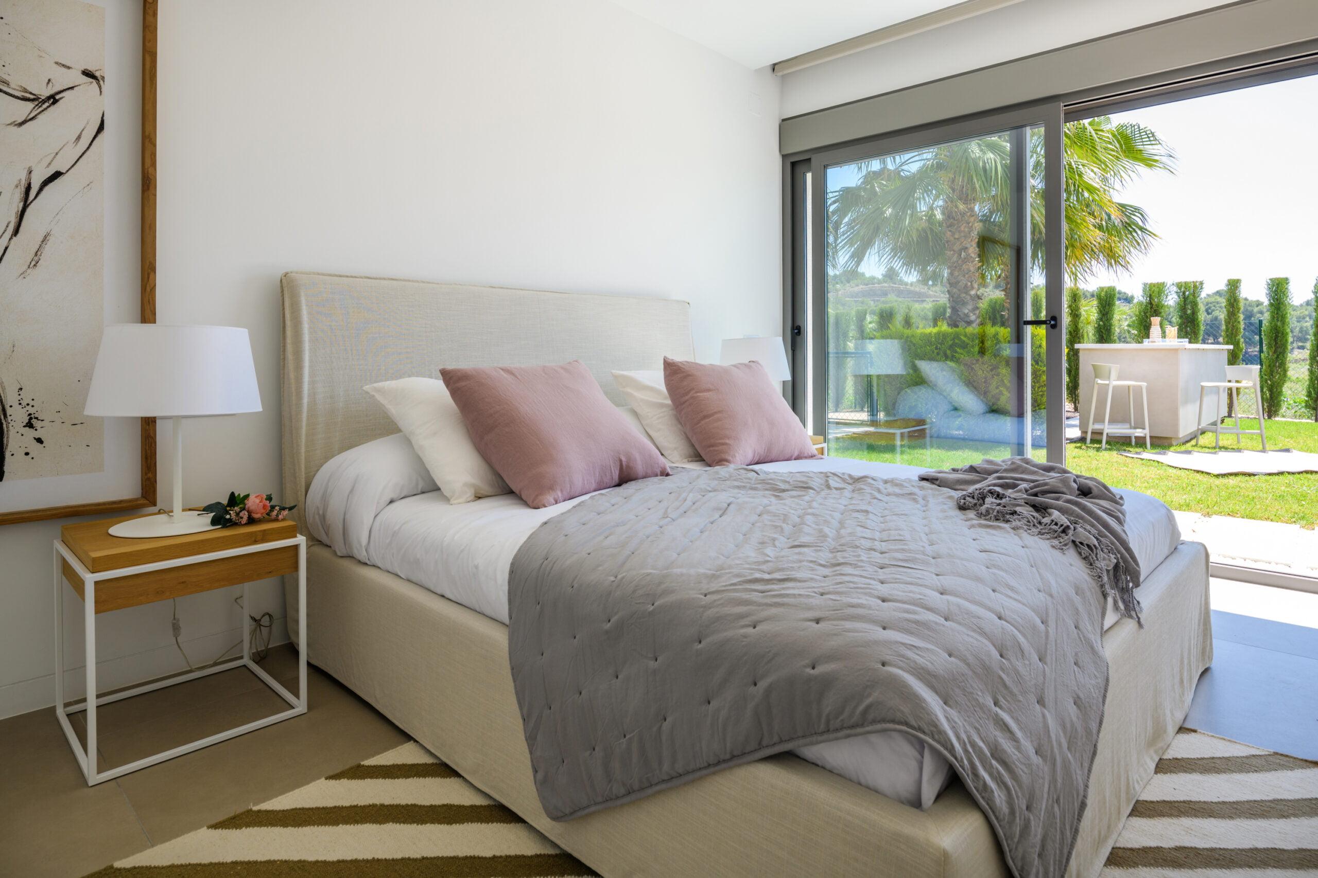 Bedroom interior with window, new-build villa in Las Colinas Golf