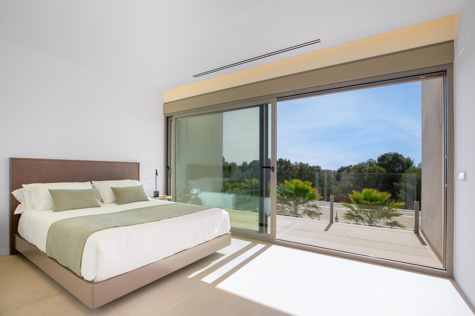 Aerial or elevated view of new-build villa plot, Las Colinas Golf