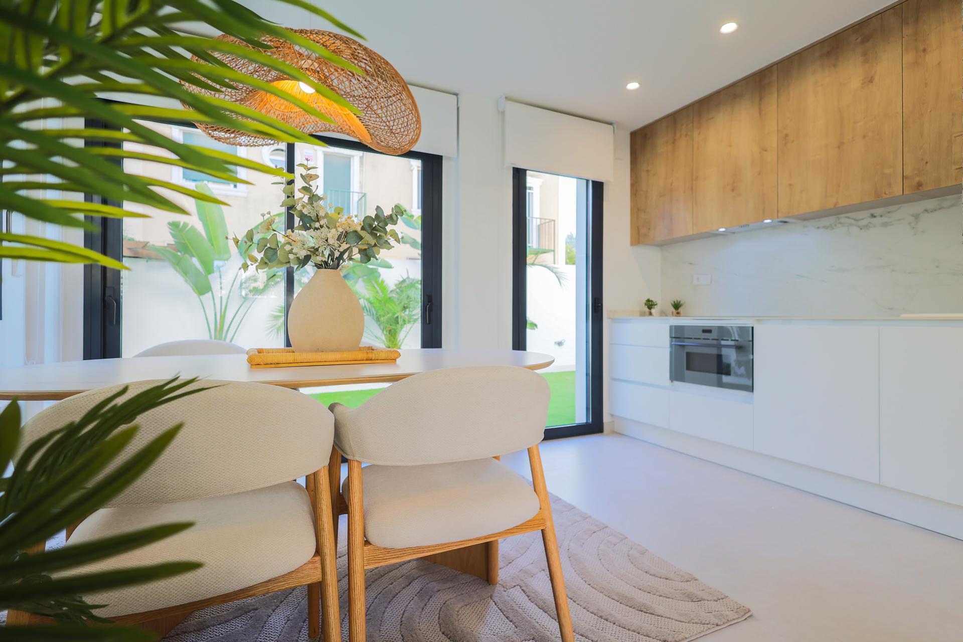 Street view of new-build villa plot in Lomas de Campoamor-Las Ramblas