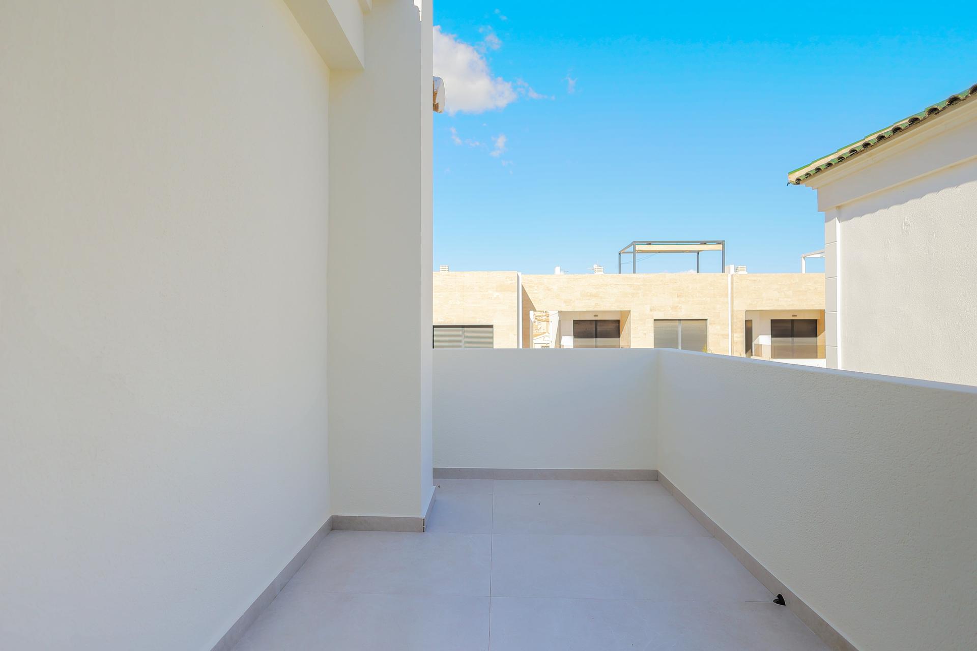 Open living area facing garden, 3-bedroom villa, Lomas de Campoamor-Las Ramblas