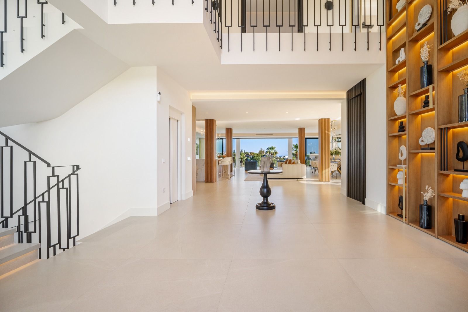 Pool area at dusk in new-build villa, Las Brisas, Marbella