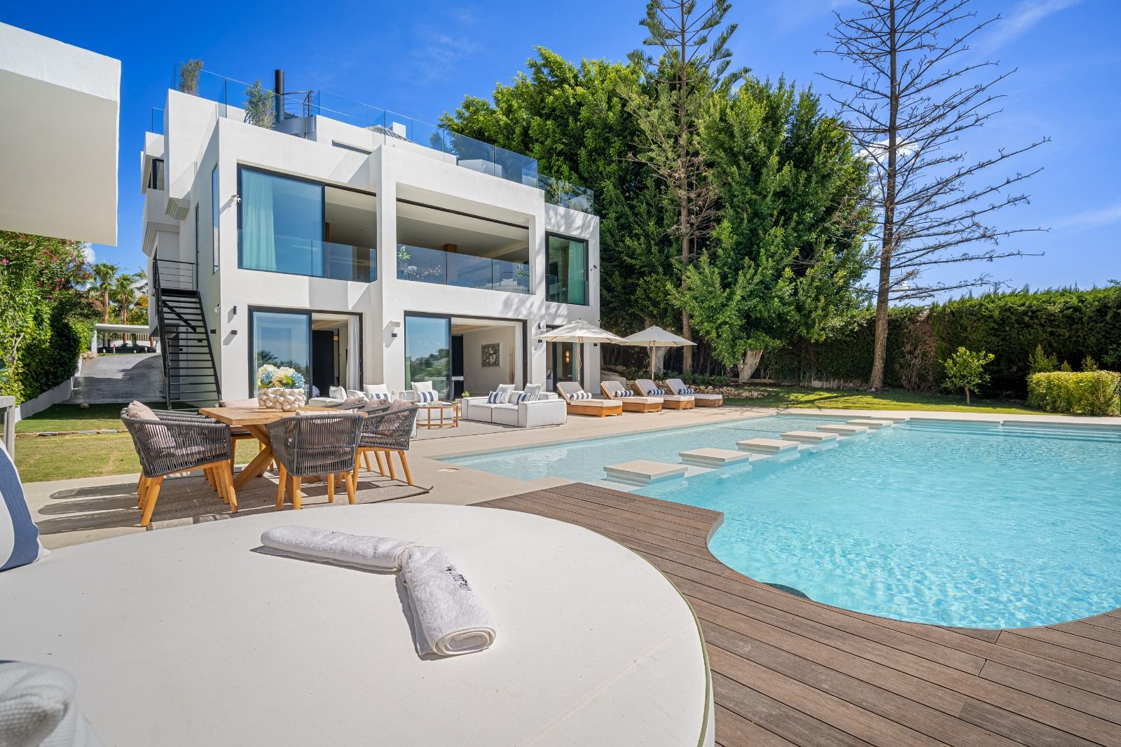 Aerial view of plot and pool in new-build villa, Las Brisas, Marbella