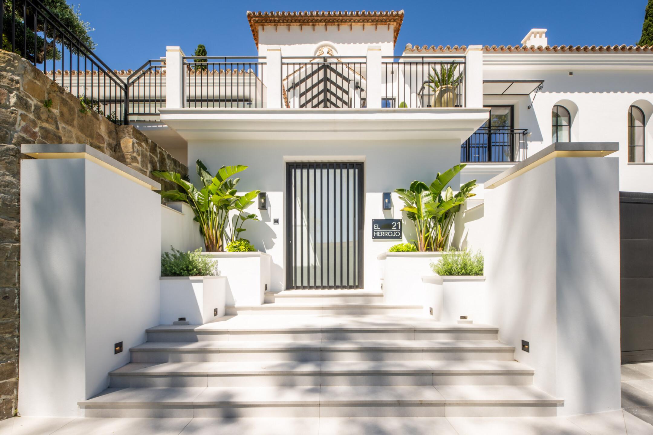 Outdoor area at dusk, new-build villa, La Quinta, Benahavis