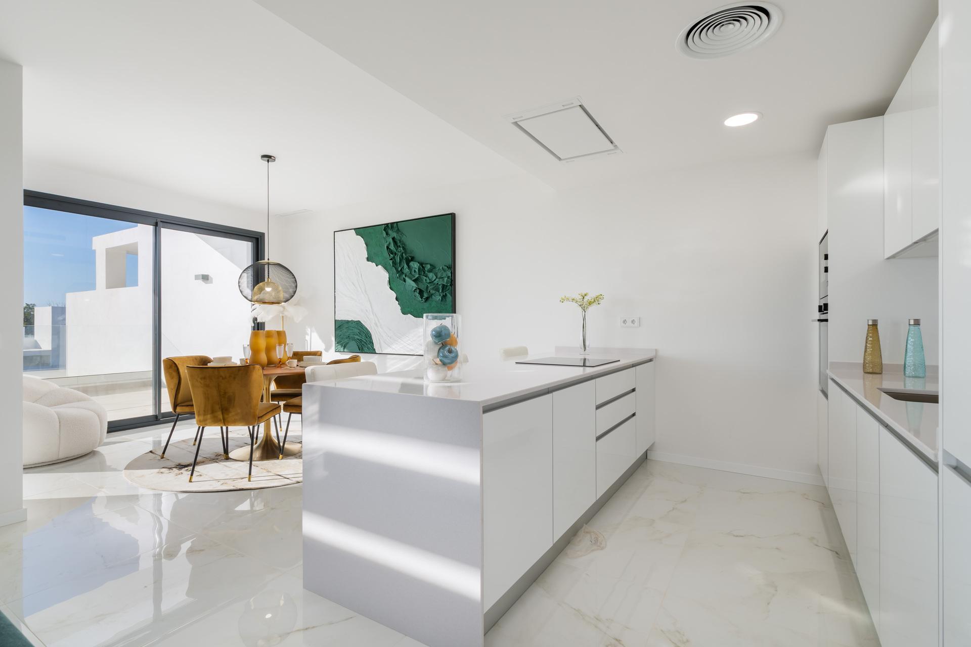 Kitchen island and dining space in penthouse, Arroyo Vaquero, Estepona