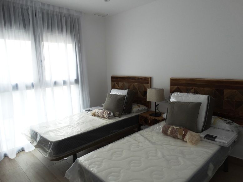Built-in storage in bedroom, new-build townhouse, Zona Pueblo, Pilar