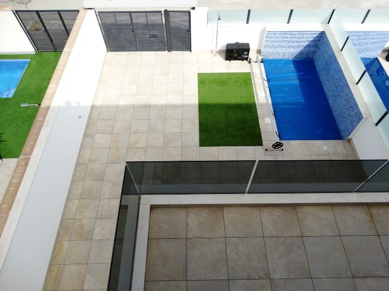 Pool area with landscaping, new-build development, Zona Pueblo, Pilar