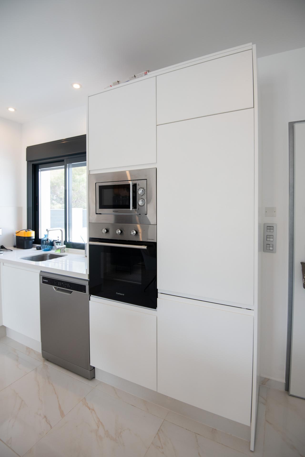 Kitchen and dining area in new-build villa, Pinar de Campoverde