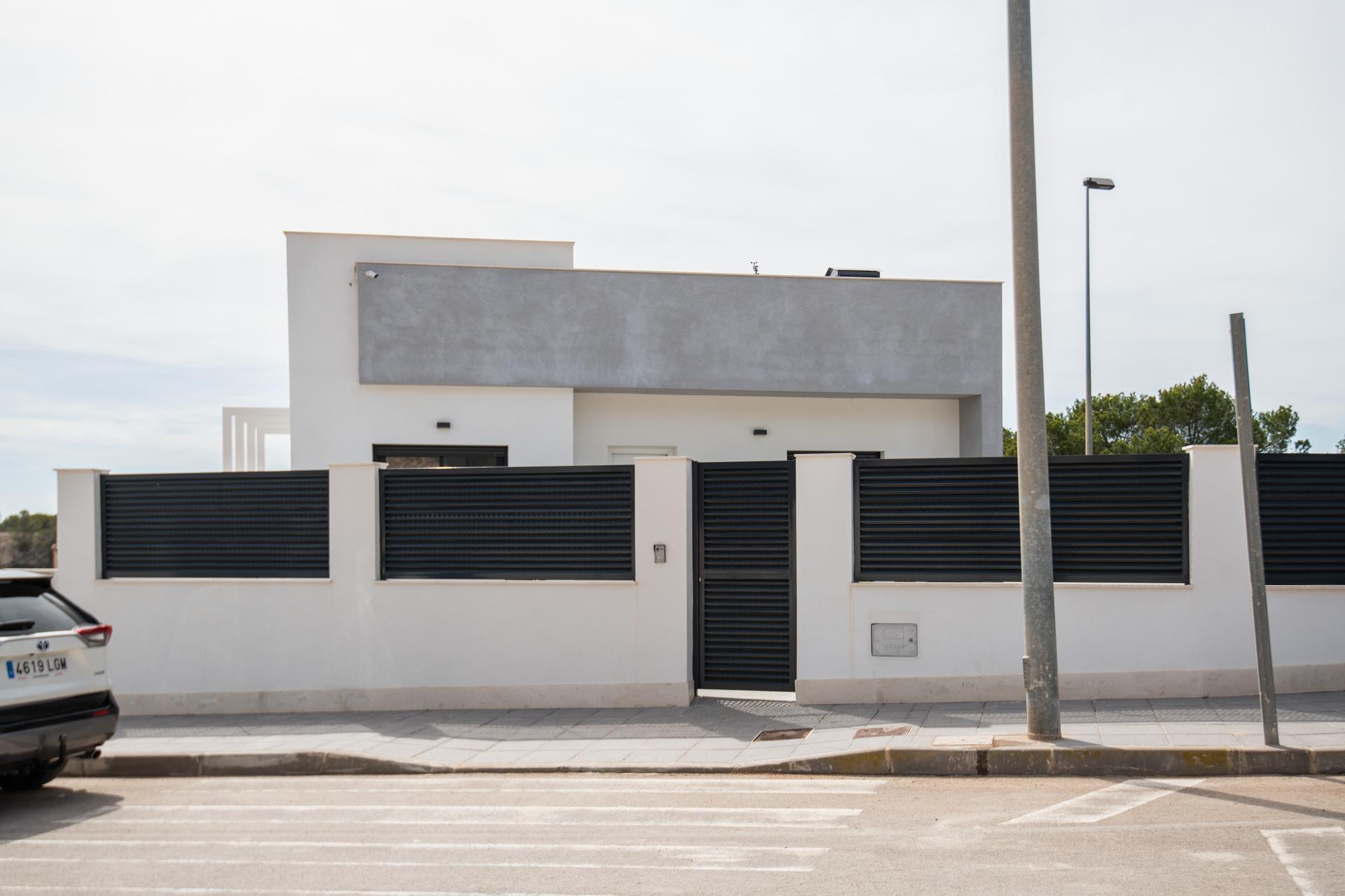 Exterior showing finished render, 2-bedroom villa Pinar de Campoverde