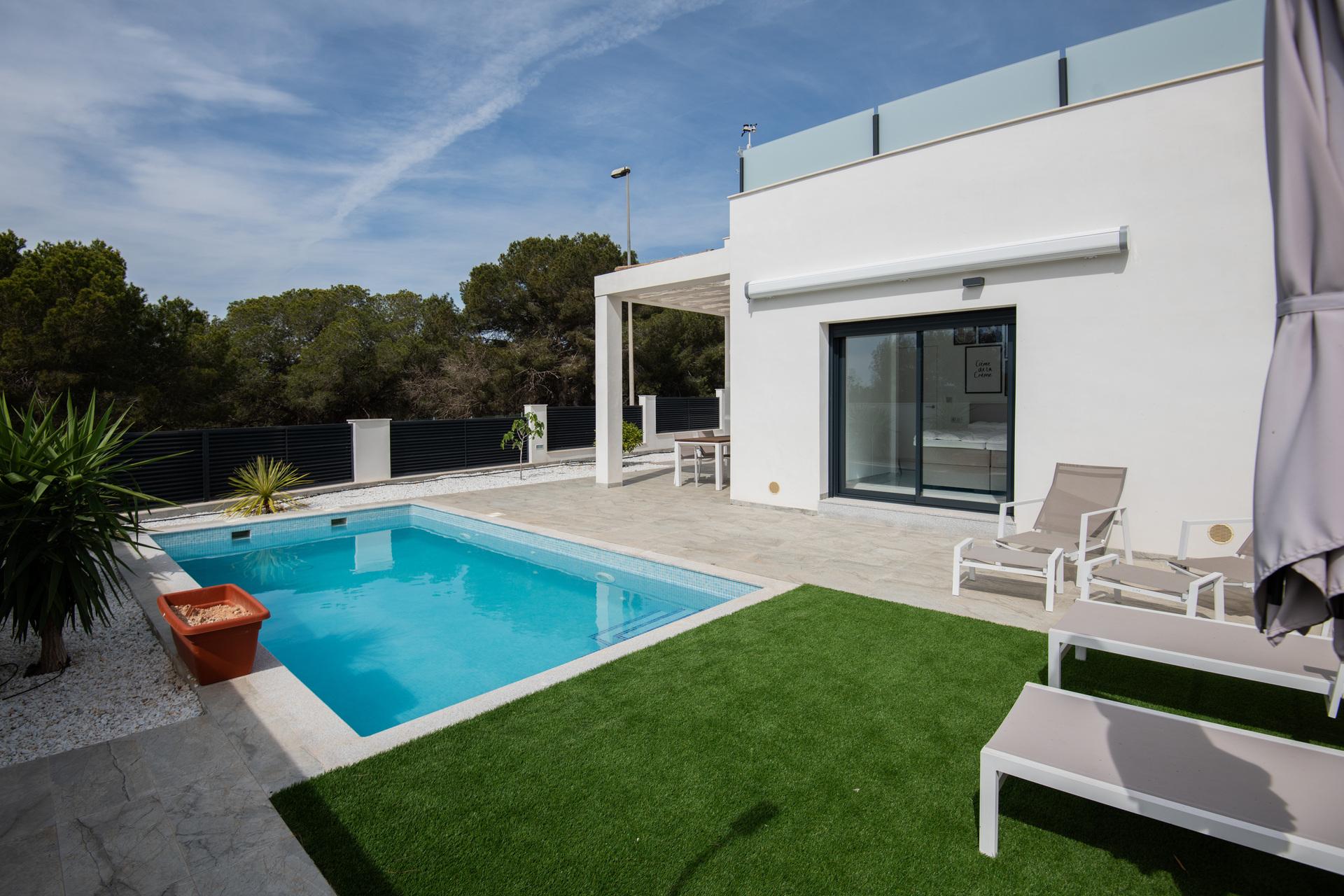 Garden level from solarium, new-build villa Pinar de Campoverde