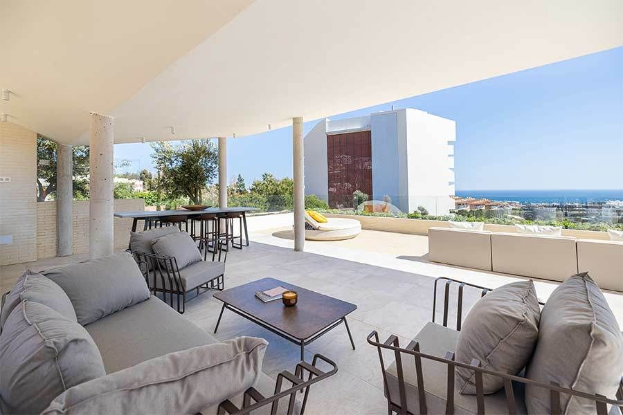 Evening exterior of new-build villa with lighting, El Higuerón, Fuengirola