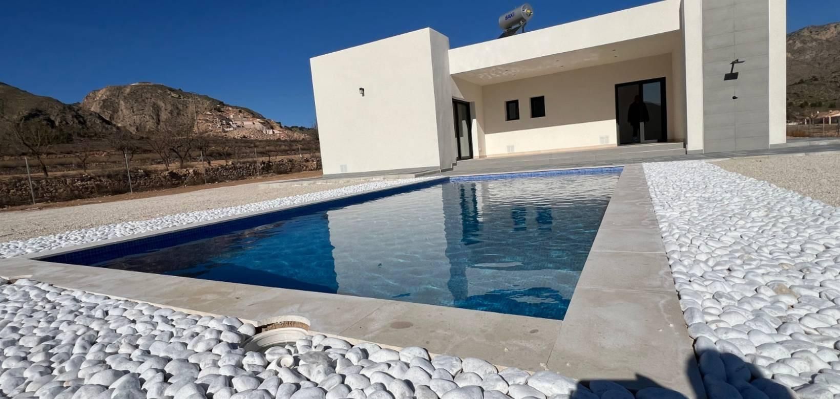 Exterior wall and window detail on new-build villa, Hondón de las Nieves