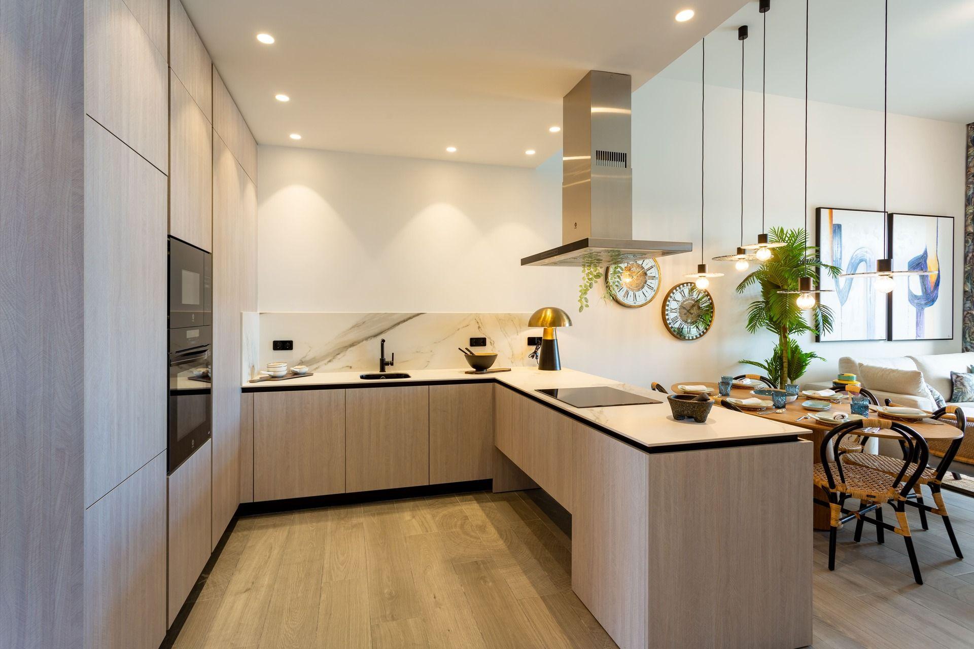 Open-plan kitchen with fitted appliances in Algorfa apartment