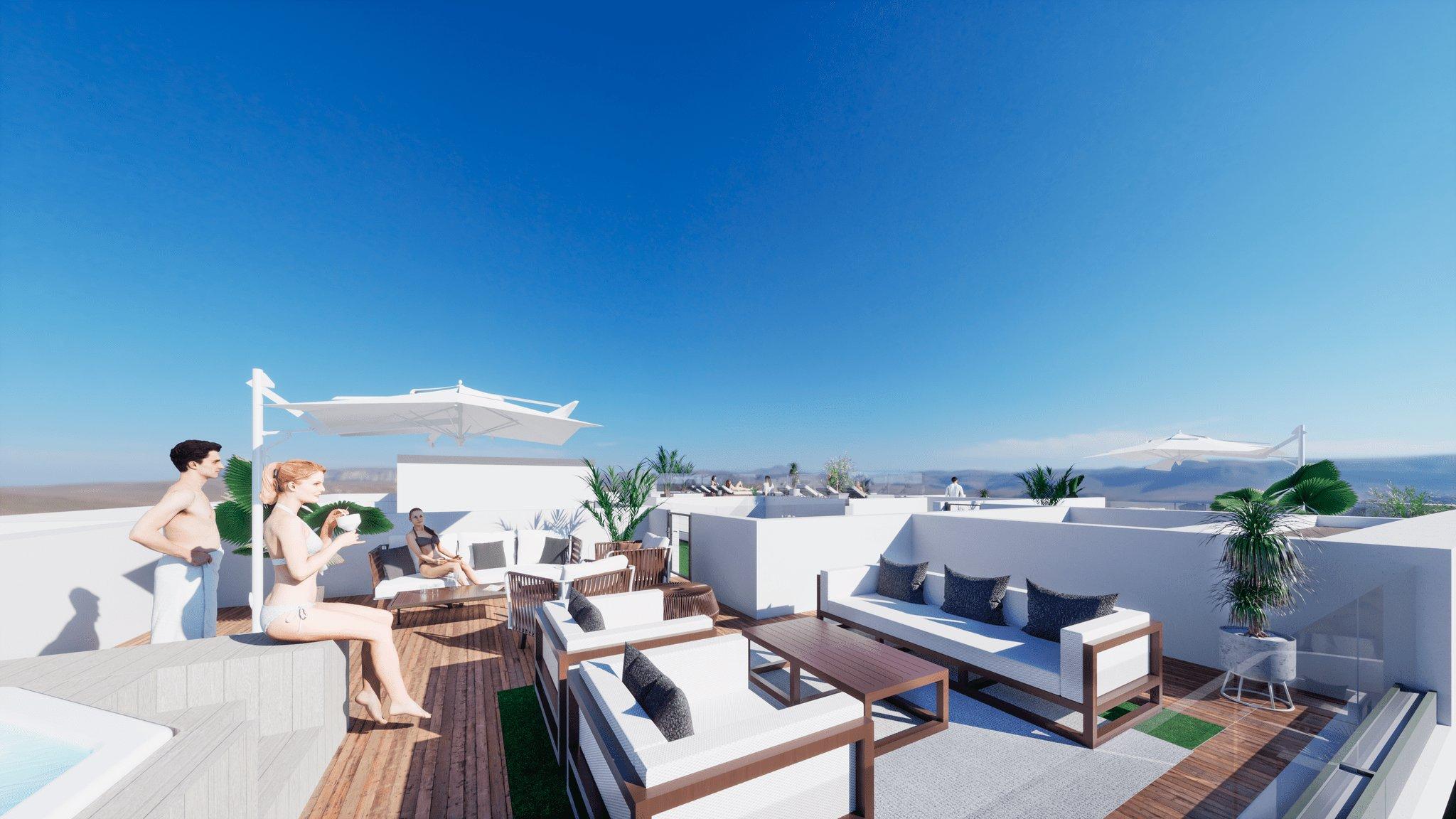Aerial render of the development by the beach