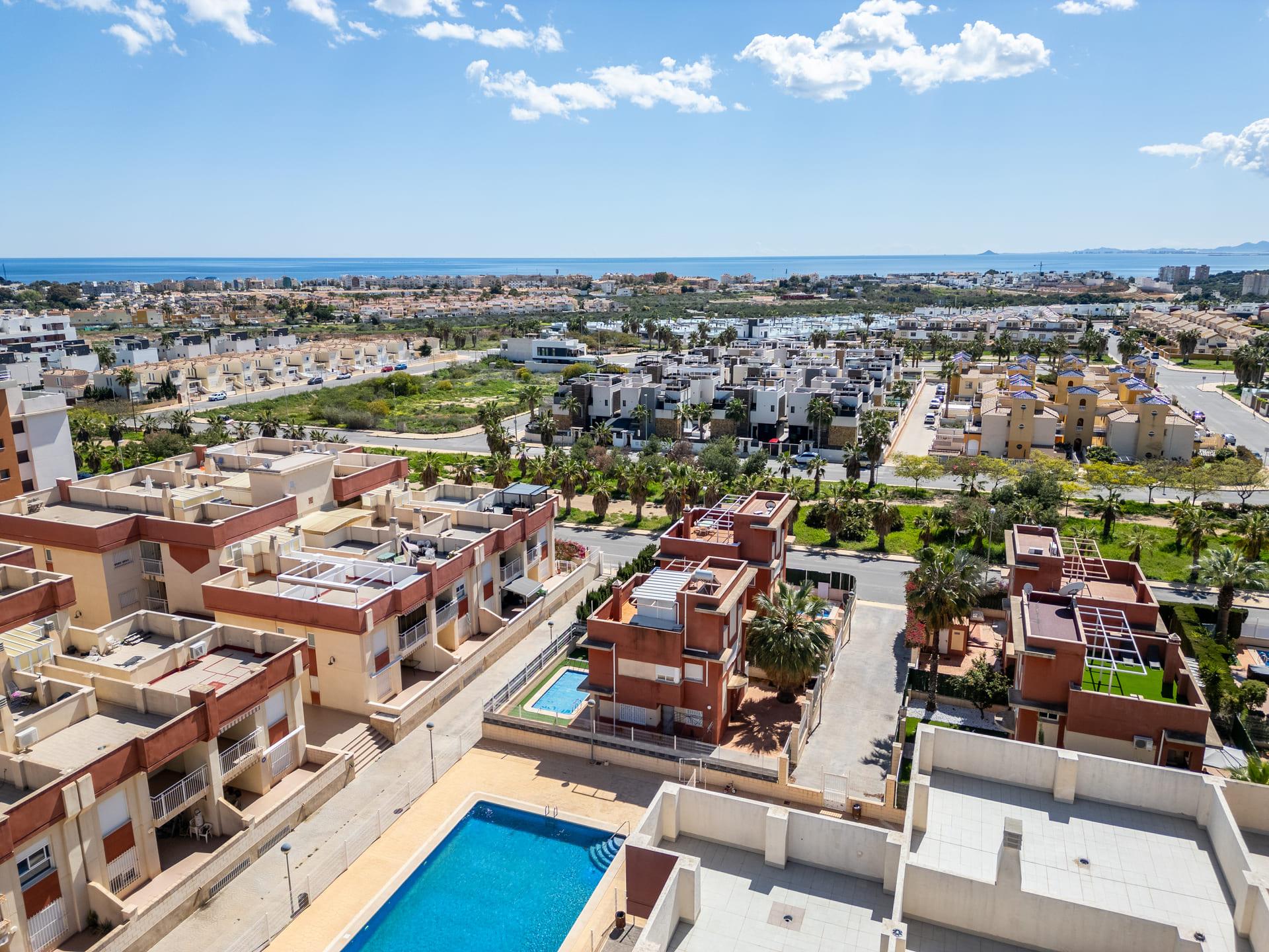 Garden and landscaping around communal pool, Los Dolses