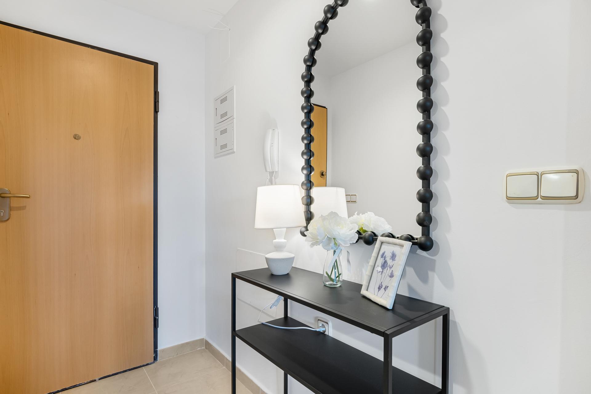 Hallway leading to bedroom and bathroom, Los Dolses apartment