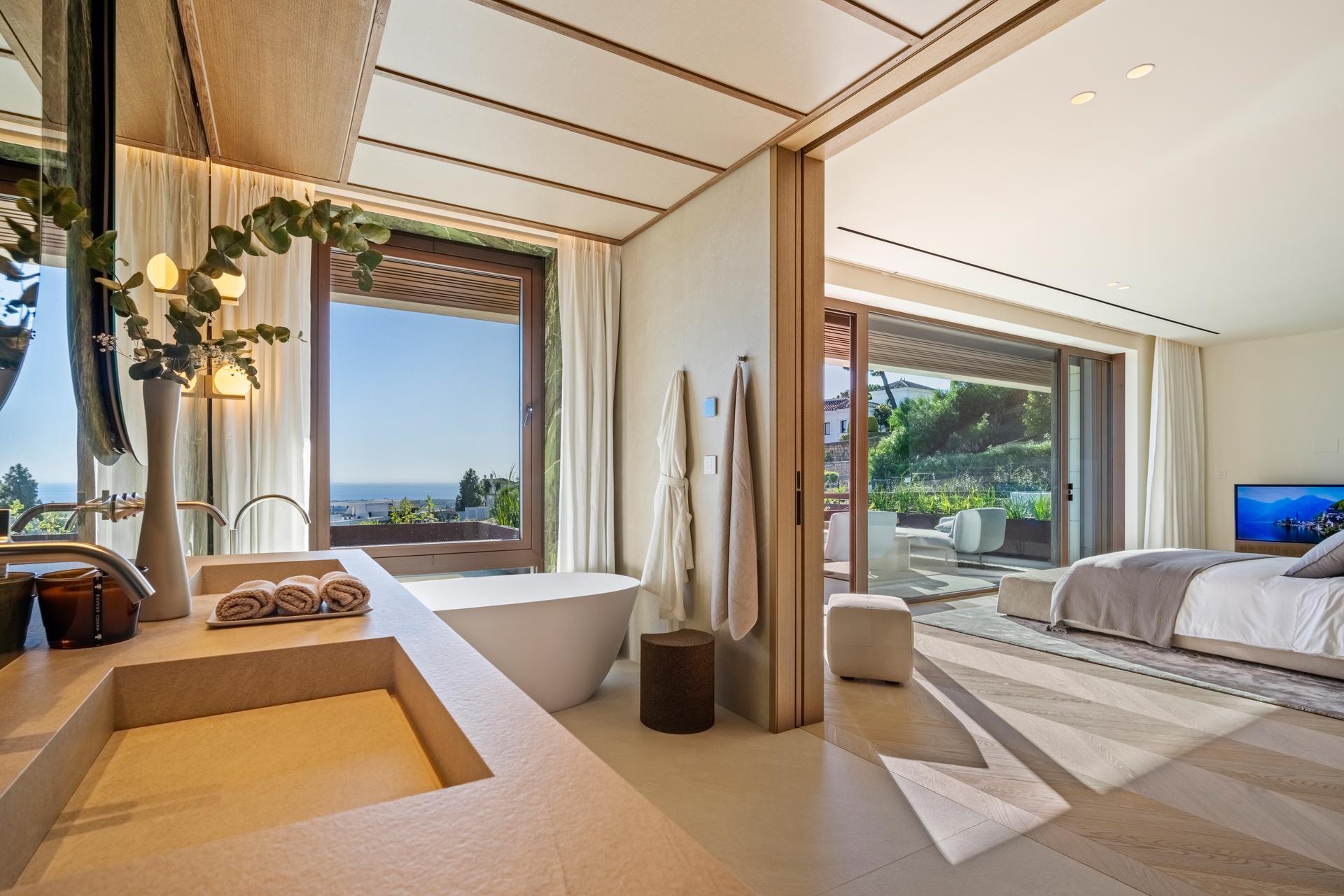 Communal pool viewed from terrace, La Quinta, Benahavis