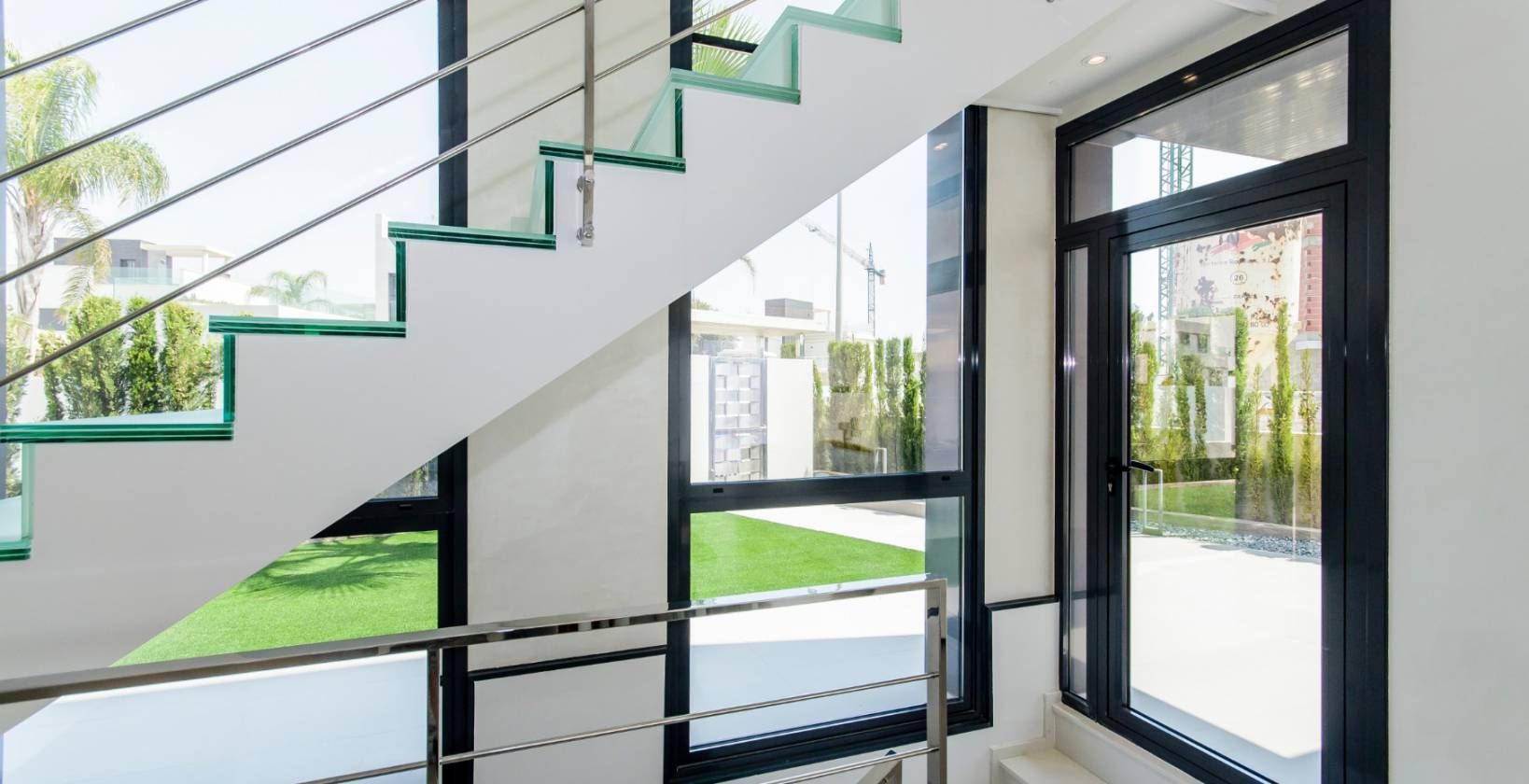 Staircase leading to upper level in villa, Campoamor
