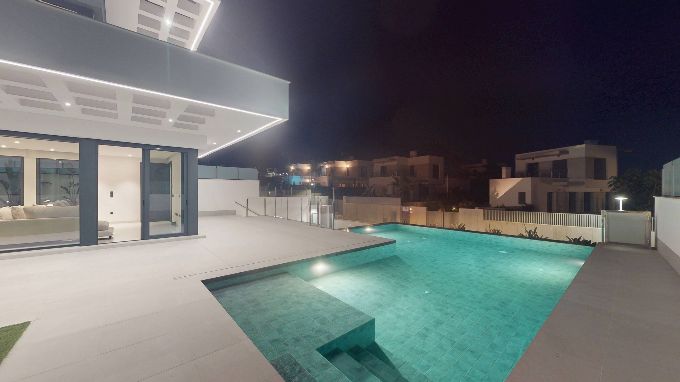Evening exterior view of new-build villa in Finestrat Hills