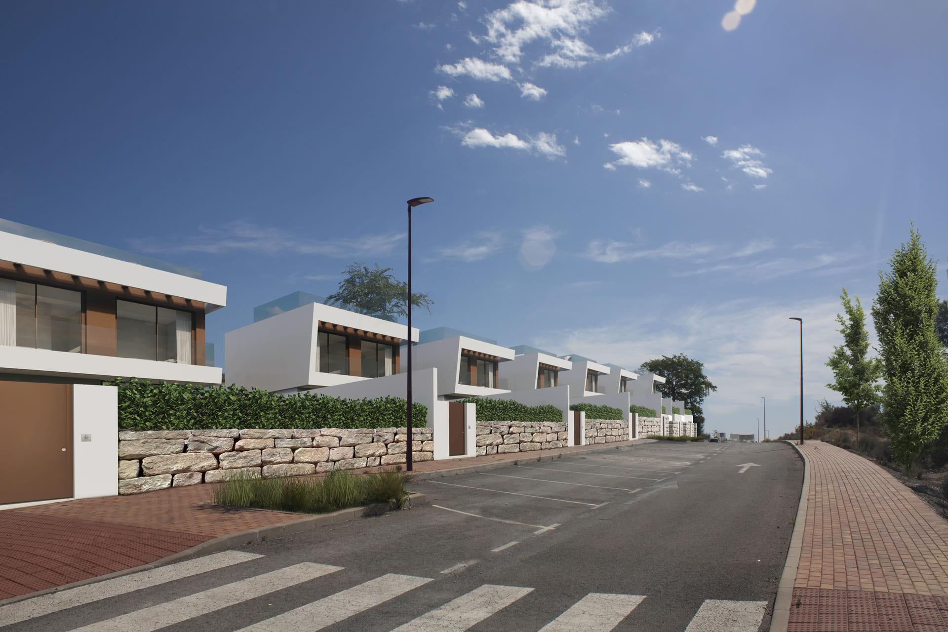 Communal pool area serving new-build villas in Golf Puig Campana