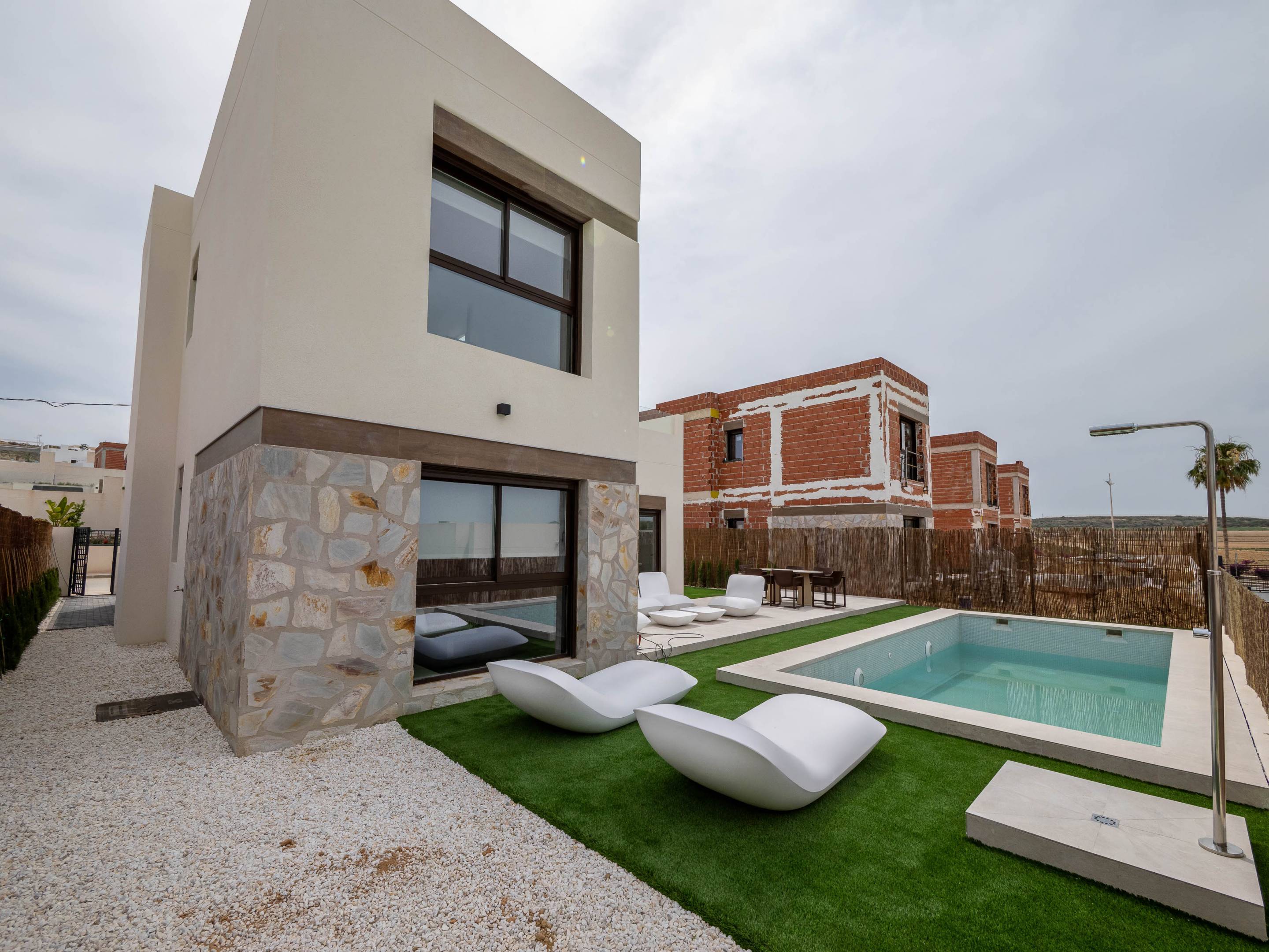 Development site context showing new-build villa, Algorfa