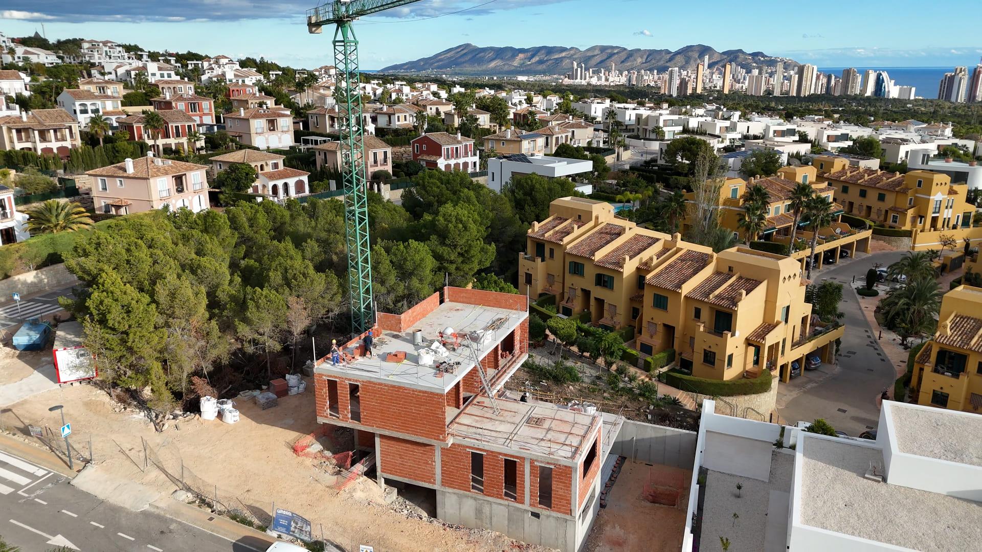 Aerial or elevated view of new-build villa plot, Sierra Cortina, Finestrat