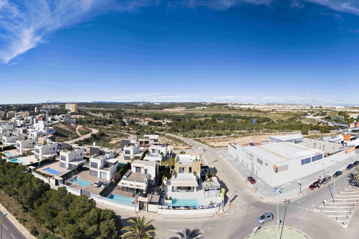 Swimming pool area at new-build villa in Campoamor, Orihuela Costa