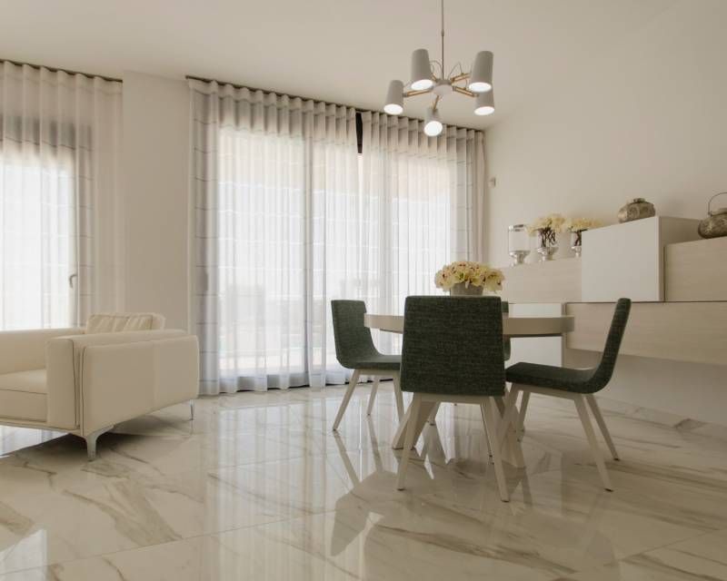 Rear facade of 4-bedroom villa in Campoamor showing outdoor area