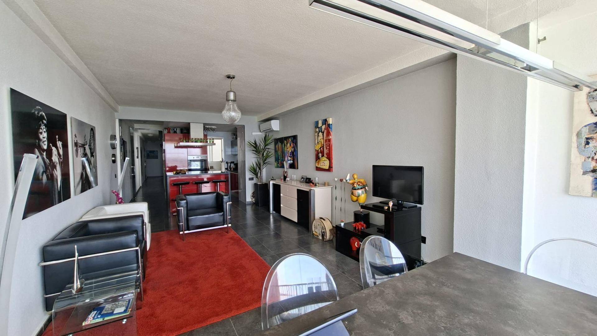 Open-plan kitchen overlooking the Mediterranean in 3-bedroom Acequion apartment