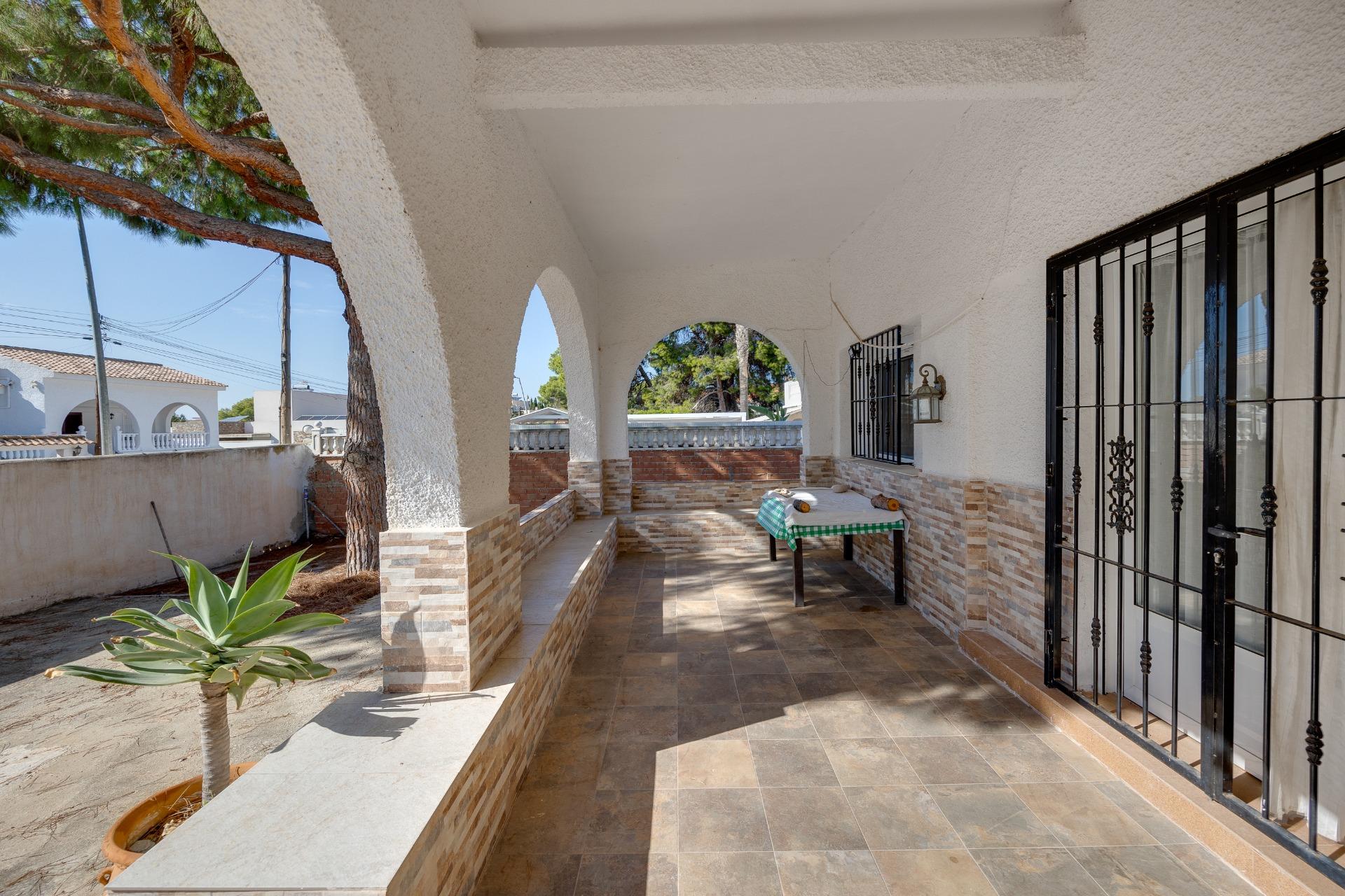 Living room with fireplace and tiled floor