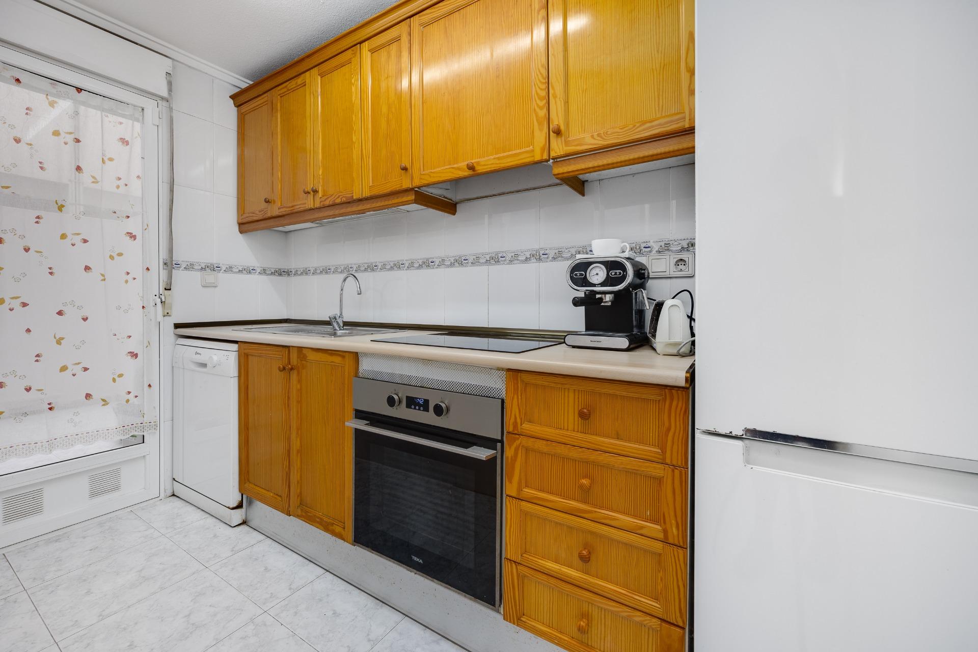 Kitchen area in apartment, Rosaleda-los frutales